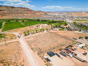 Birds eye view of property with a mountain view