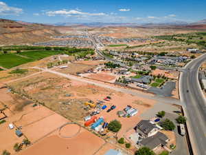 Aerial view featuring a mountain view and a residential view
