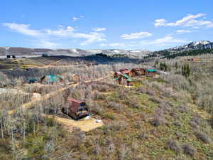 Drone / aerial view featuring a mountain view and a rural view