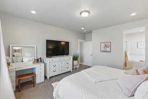 Bedroom with recessed lighting and carpet flooring