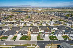Drone / aerial view featuring a residential view and a mountain view