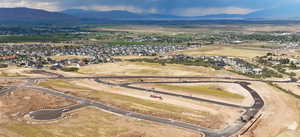 Drone / aerial view featuring a mountain view