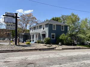 Corner of Harrison Blvd & 37th St with Raised Lighted Sign