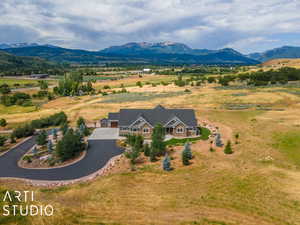 Drone / aerial view with a rural view and a mountain view
