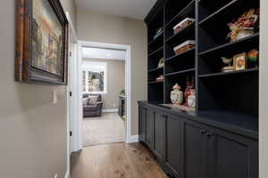 Hallway featuring light hardwood / wood-style floors