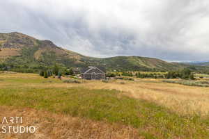 Property view of mountains featuring a rural view