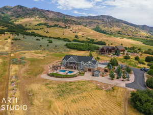 Aerial view with a mountain view and a rural view