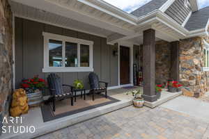 View of patio featuring covered porch