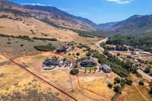 Aerial view featuring a mountain view and a rural view
