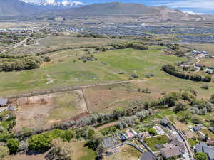Birds eye view of property with a mountain view
