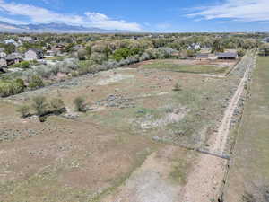 Birds eye view of property featuring a residential view and a mountain view