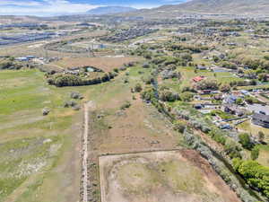 Drone / aerial view featuring a rural view and a mountain view