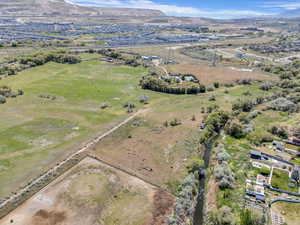 Aerial view featuring a rural view and a mountain view