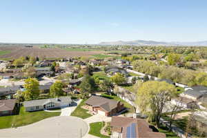 Drone / aerial view featuring a residential view and a mountain view