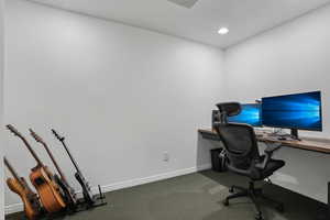 Home office with baseboards and recessed lighting
