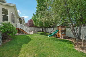 View of yard featuring a playground