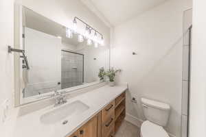 Full bathroom with vanity, tile patterned flooring, and an enclosed shower