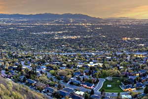 Aerial view at dusk featuring a mountain view