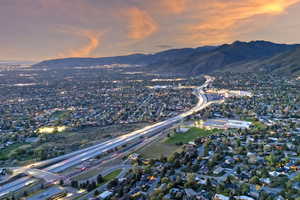 Birds eye view of property with a mountain view