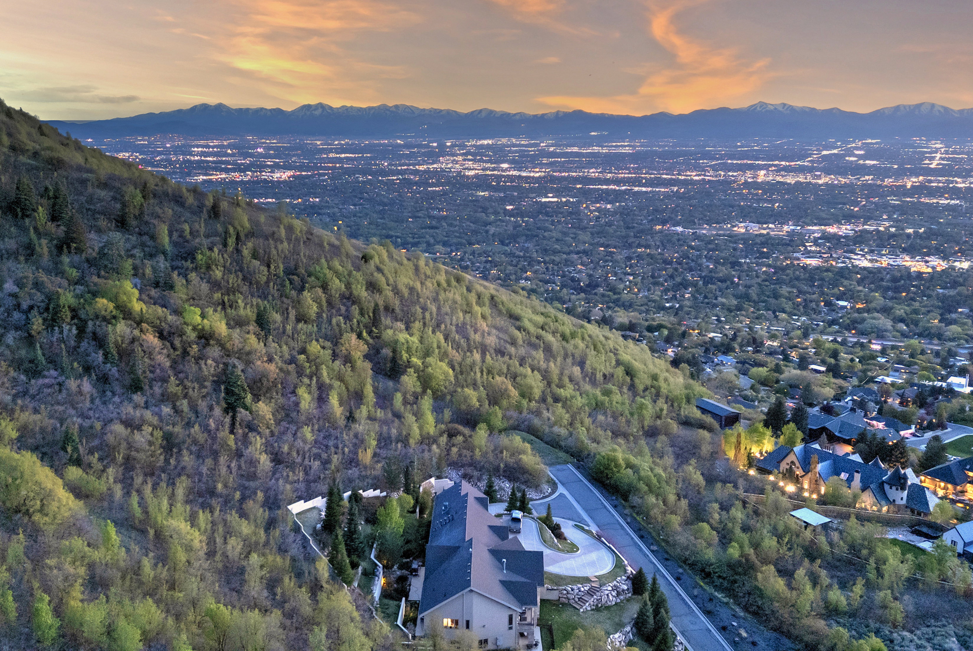 Drone / aerial view with a view of trees and a mountain view