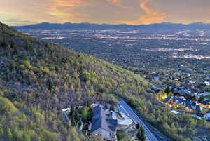 Drone / aerial view with a view of trees and a mountain view