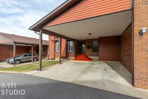 Exterior space with an attached carport