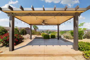 View of patio featuring a ceiling fan and a fenced backyard