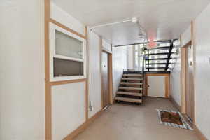 Corridor with concrete floors and stairs