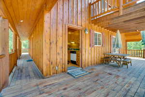 Wooden terrace with outdoor dining space