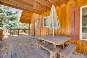 Wooden deck with outdoor dining area
