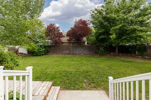 View of yard featuring a deck