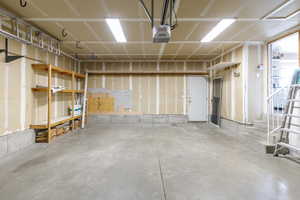 Garage featuring a garage door opener