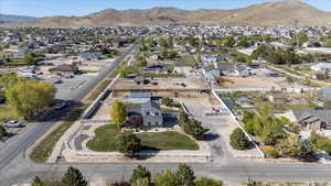 Birds eye view of property with a mountain view