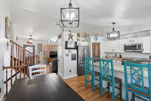 Recently painted cabinetry for a bright open space