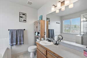 Grand Master Bathroom features a separate shower and bathtub