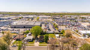 Birds eye view of property with a mountain view