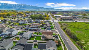 Birds eye view of property featuring a residential view and a mountain view