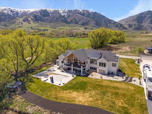 Birds eye view of property with a mountain view