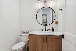 Half bath with toilet and vanity