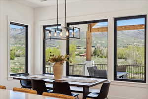 Dining room with an inviting chandelier and visible vents