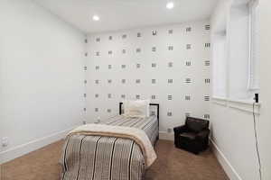 Bedroom with carpet, baseboards, and recessed lighting