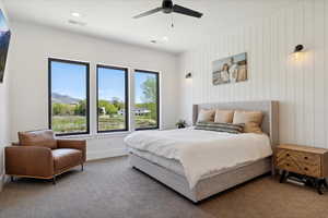 Carpeted bedroom with baseboards, a ceiling fan, visible vents, and recessed lighting