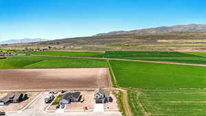 Birds eye view of property with a rural view and a mountain view