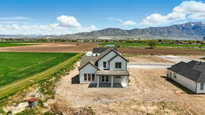 Exterior space with a rural view and a mountain view