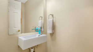 1/2 Bathroom featuring a sink