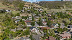 Bird's eye view featuring a mountain view and a residential view