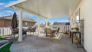 View of patio / terrace featuring a fenced backyard and outdoor dining space