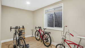 Interior space featuring baseboards and light wood-style flooring