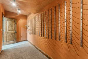 Interior space featuring baseboards and carpet floors