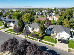 Birds eye view of property featuring a residential view and a mountain view